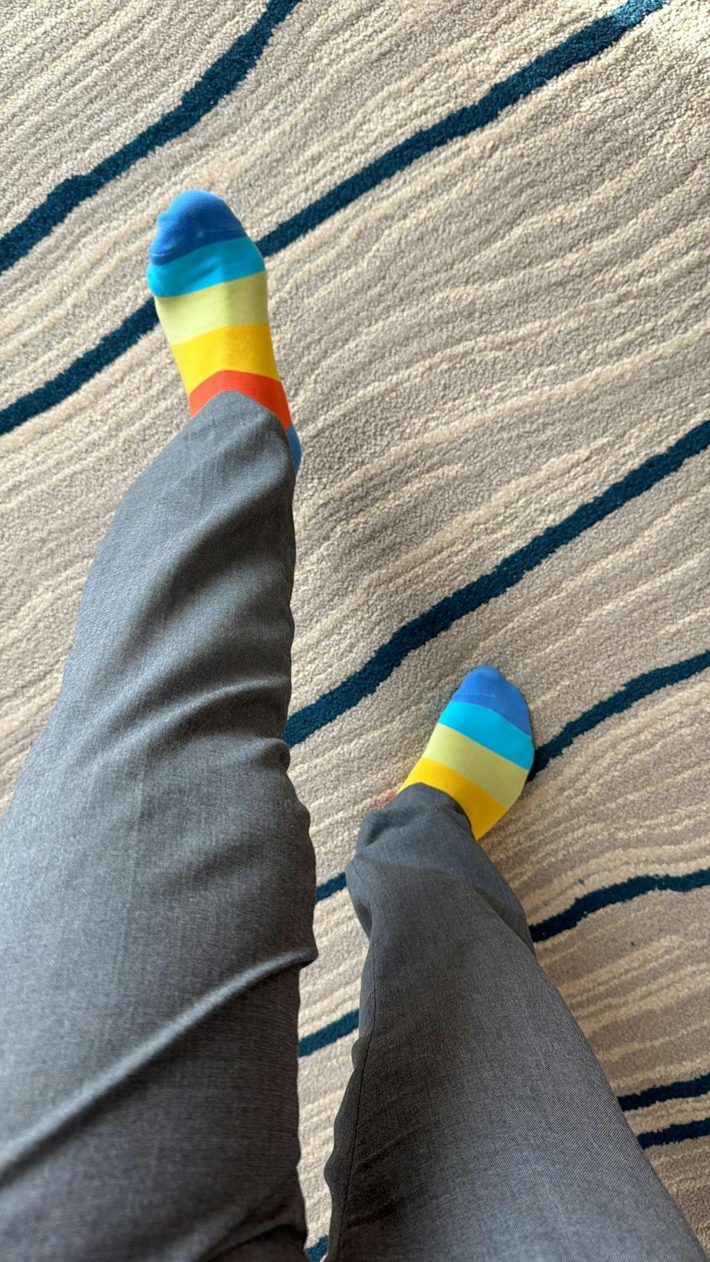 Customer wearing Jumplings rainbow ankle socks